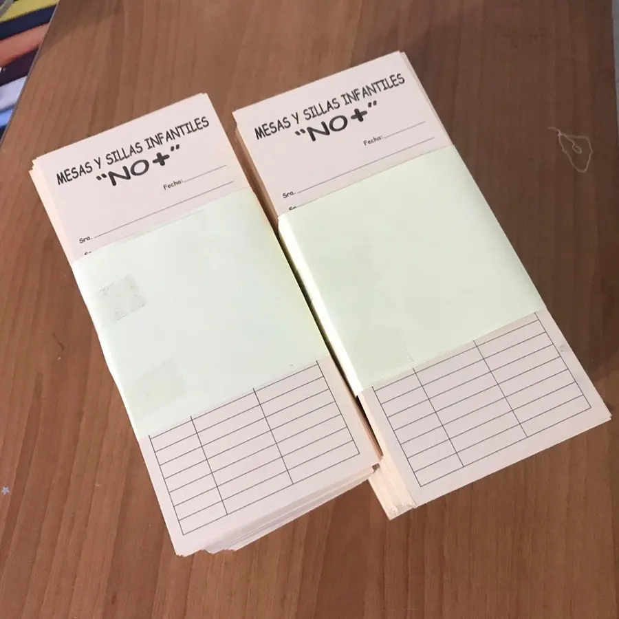 Dos blocks de notas impresos para un negocio de renta de mesas y sillas